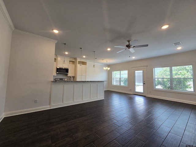 823 Lindsey Ln, Whitehouse, TX 75791 - unfurnished living room with ceiling fan, recessed lighting, wood tiled floors, and ornamental molding