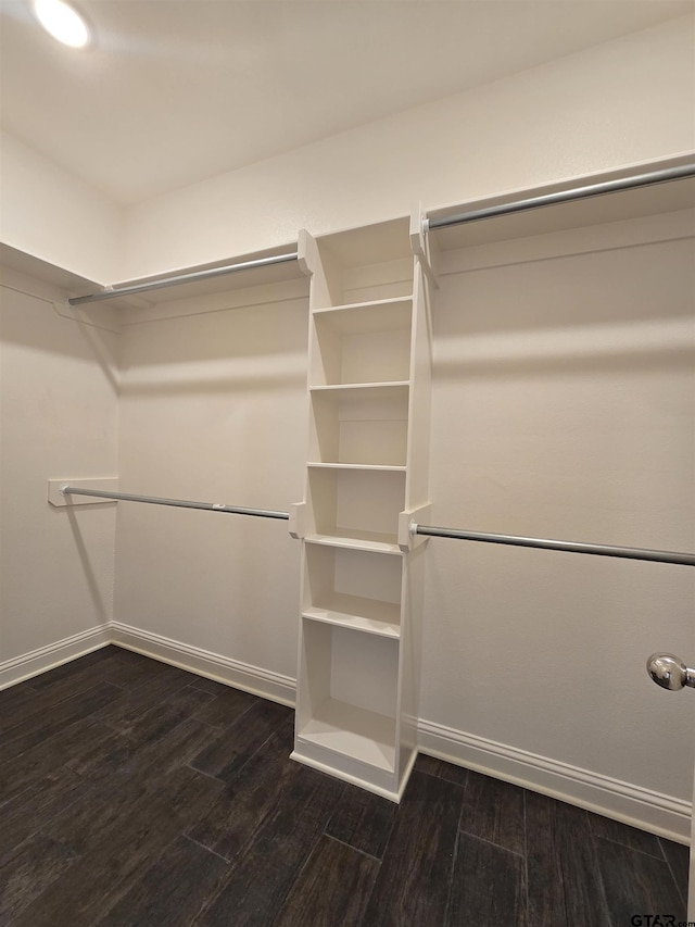 823 Lindsey Ln, Whitehouse, TX 75791 - spacious closet with dark wood-type flooring