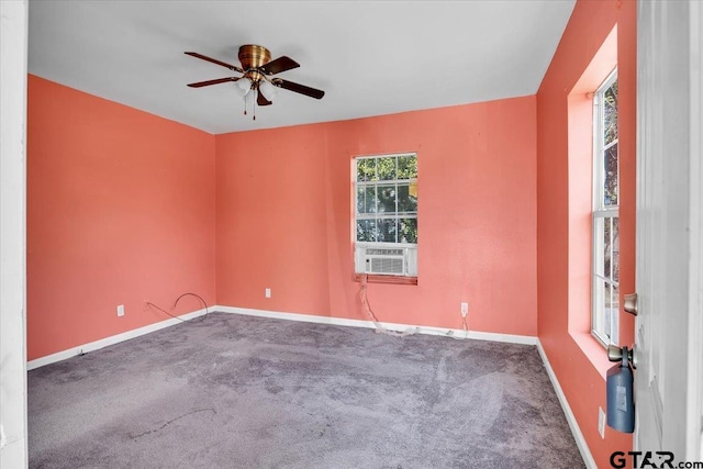 carpeted empty room with cooling unit and ceiling fan