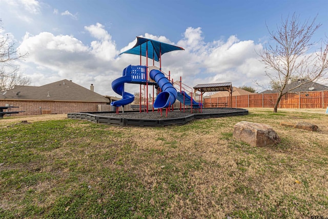 view of jungle gym featuring a yard