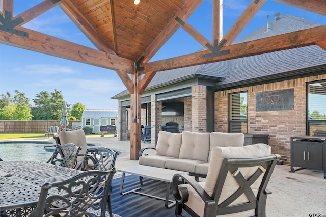 21562 Castle Rock Cir, Bullard, TX 75757 - view of patio / terrace featuring an outdoor living space with a fireplace and fence