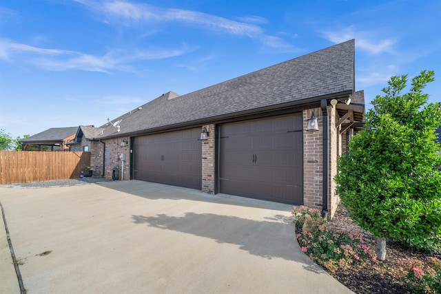 21562 Castle Rock Cir, Bullard, TX 75757 - view of side of property featuring brick siding, fence, roof with shingles, and concrete driveway