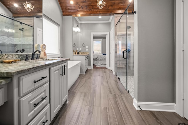 21562 Castle Rock Cir, Bullard, TX 75757 - bathroom featuring ornamental molding, a stall shower, baseboards, vanity, and wooden ceiling