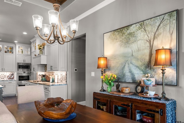 21562 Castle Rock Cir, Bullard, TX 75757 - dining room featuring a chandelier and recessed lighting