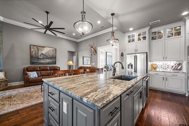 21562 Castle Rock Cir, Bullard, TX 75757 - kitchen with a sink, appliances with stainless steel finishes, gray cabinetry, recessed lighting, and open floor plan