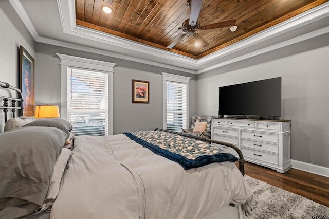 21562 Castle Rock Cir, Bullard, TX 75757 - bedroom featuring a tray ceiling, wood ceiling, crown molding, baseboards, and dark wood finished floors