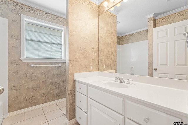 full bathroom with tile patterned flooring, vanity, baseboards, wallpapered walls, and crown molding