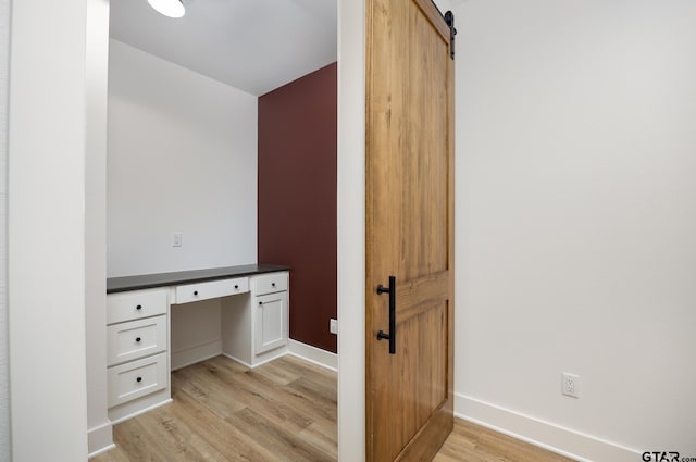 bathroom with wood-type flooring