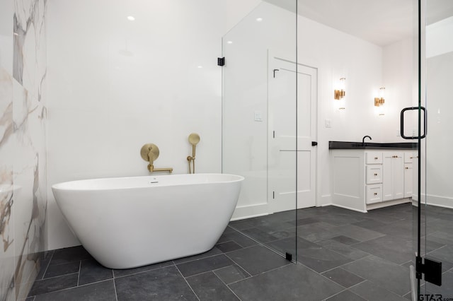 bathroom with tile patterned flooring, shower with separate bathtub, and vanity