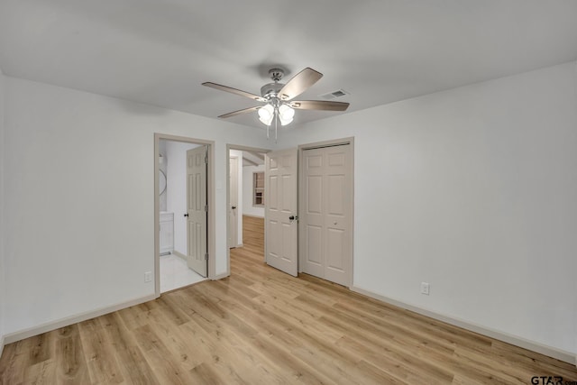 unfurnished bedroom with ceiling fan and light hardwood / wood-style flooring