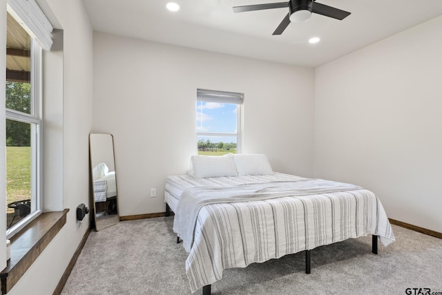 bedroom featuring recessed lighting, carpet flooring, and baseboards