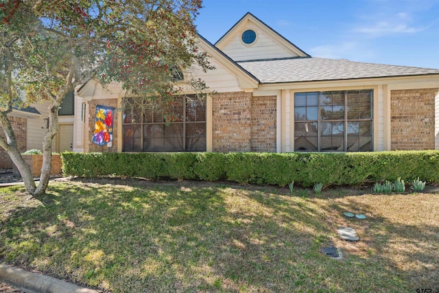 view of front of property with a front lawn