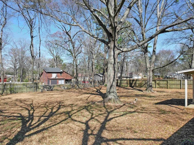 view of yard with fence