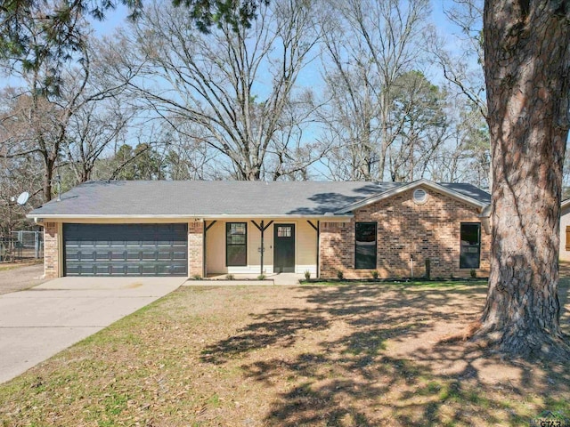 single story home with brick siding, a front lawn, concrete driveway, and a garage