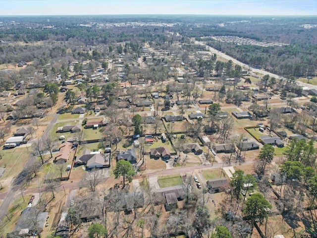 birds eye view of property with a residential view