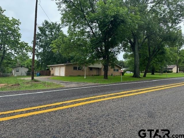 504 Mt Sylvan, Lindale, TX 75771 - view of front of home with a garage and asphalt driveway