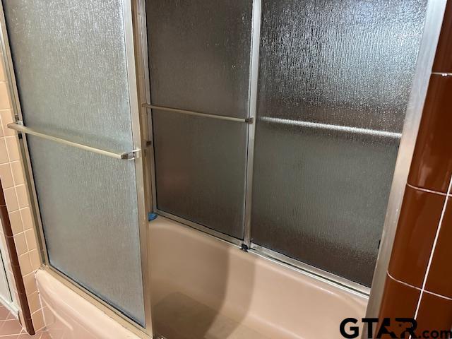 504 Mt Sylvan, Lindale, TX 75771 - full bathroom with enclosed tub / shower combo