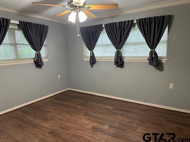 504 Mt Sylvan, Lindale, TX 75771 - unfurnished room with ornamental molding, wood finished floors, baseboards, and ceiling fan
