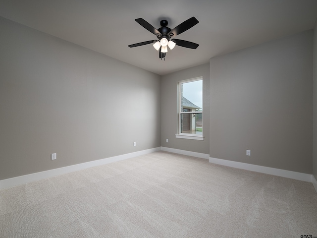 328 Heritage Way, Bullard, TX 75757 - empty room featuring baseboards, a ceiling fan, and light carpet