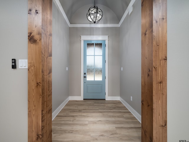 328 Heritage Way, Bullard, TX 75757 - foyer featuring a chandelier, baseboards, light wood finished floors, and vaulted ceiling