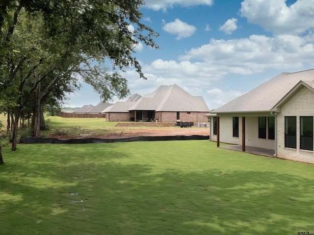 328 Heritage Way, Bullard, TX 75757 - view of grassy yard with a patio area
