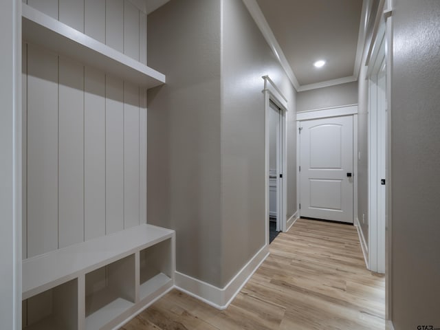 328 Heritage Way, Bullard, TX 75757 - mudroom with light wood-style flooring, baseboards, and crown molding