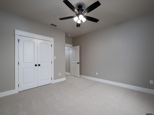 328 Heritage Way, Bullard, TX 75757 - unfurnished bedroom featuring light colored carpet, baseboards, a closet, and ceiling fan