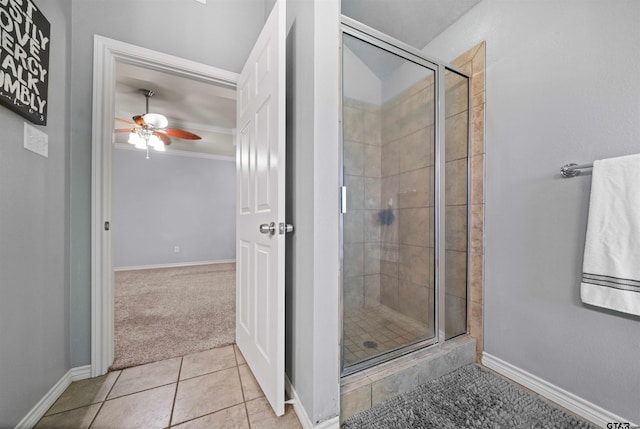 17570 Regal Row, Flint, TX 75762 - full bath with a shower stall, ceiling fan, tile patterned floors, baseboards, and crown molding