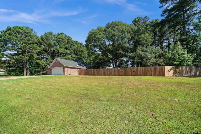17570 Regal Row, Flint, TX 75762 - view of yard featuring an attached garage and concrete driveway