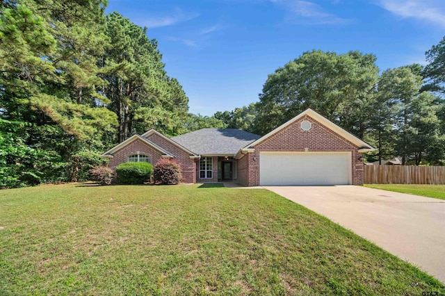 17570 Regal Row, Flint, TX 75762 - ranch-style home with a garage, concrete driveway, and brick siding