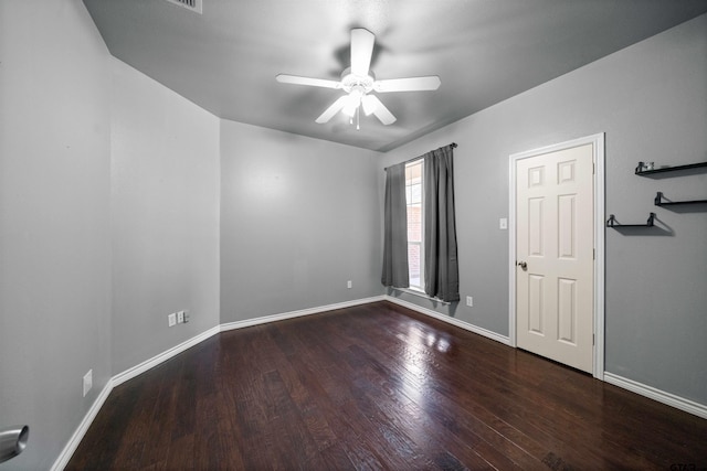 17570 Regal Row, Flint, TX 75762 - spare room featuring ceiling fan, wood finished floors, and baseboards