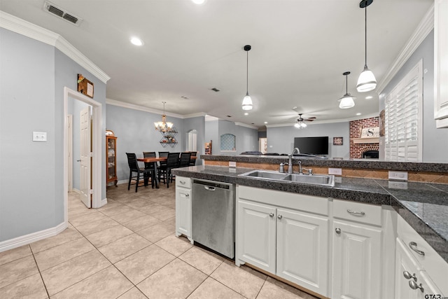 17570 Regal Row, Flint, TX 75762 - kitchen with stainless steel dishwasher, a sink, tile countertops, crown molding, and a fireplace