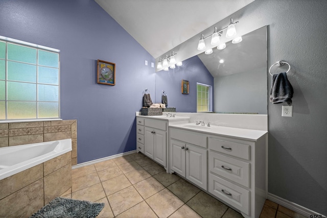 17570 Regal Row, Flint, TX 75762 - full bathroom featuring lofted ceiling, vanity, a bath, tile patterned flooring, and baseboards