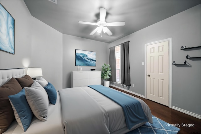 17570 Regal Row, Flint, TX 75762 - bedroom with wood finished floors, baseboards, and ceiling fan