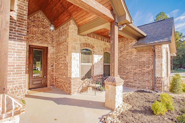 entrance to property with a patio area