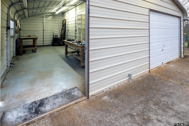 garage featuring driveway