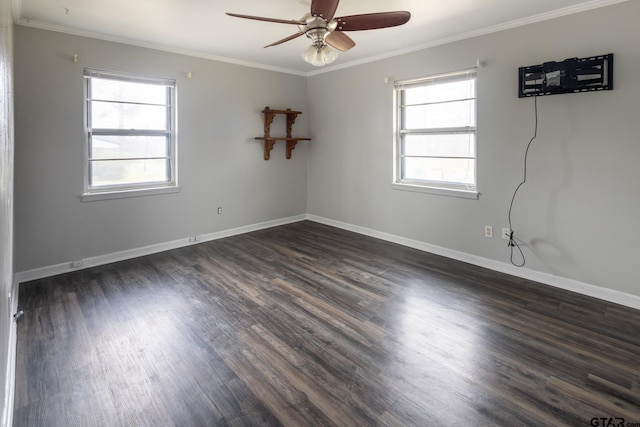 empty room with a wealth of natural light and crown molding