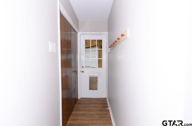 327 Dailey Rd, Crockett, TX 75835 - hallway with dark wood finished floors and baseboards