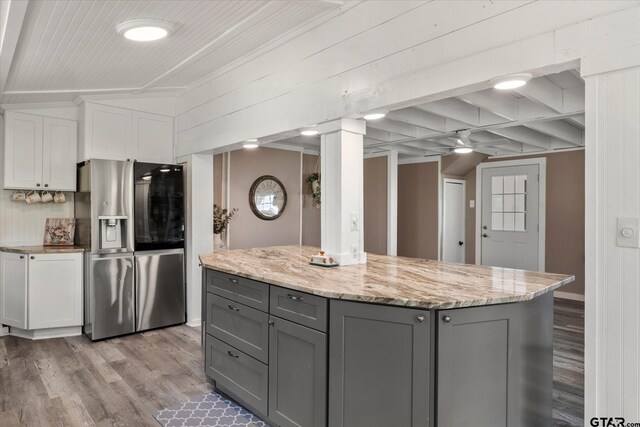 7928 Fm 127, Mount Pleasant, TX 75455 - kitchen with stainless steel refrigerator with ice dispenser, gray cabinets, light wood-style floors, white cabinets, and crown molding