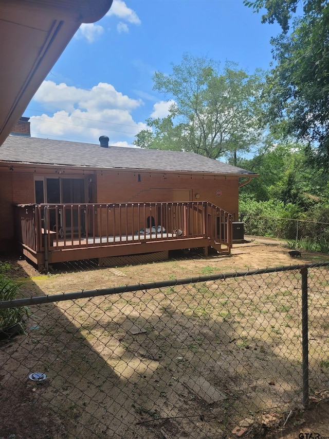 rear view of property with a deck