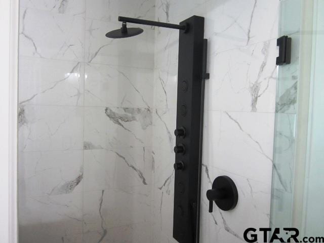 8016 Crooked Trl, Tyler, TX 75703 - full bathroom featuring a marble finish shower