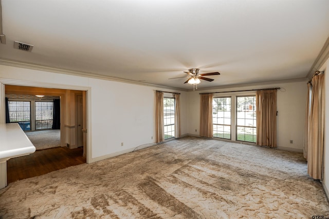 unfurnished room featuring dark hardwood / wood-style flooring, ceiling fan, and ornamental molding