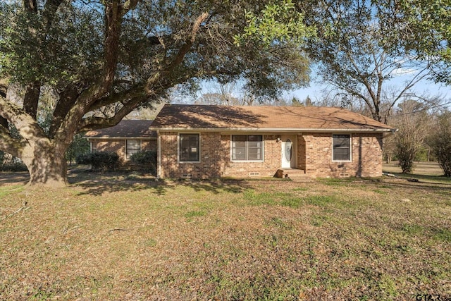 single story home with a front yard, crawl space, and brick siding