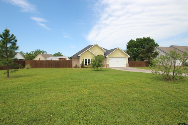ranch-style house with a garage, fence, a front lawn, brick siding, and driveway