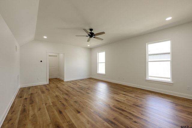 unfurnished room featuring a ceiling fan, baseboards, wood finished floors, and recessed lighting