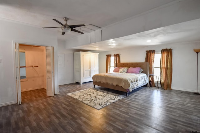 unfurnished bedroom with dark wood-type flooring, a ceiling fan, and baseboards