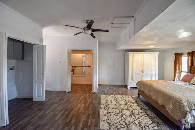 bedroom featuring a ceiling fan, baseboards, ornamental molding, and dark wood-style flooring