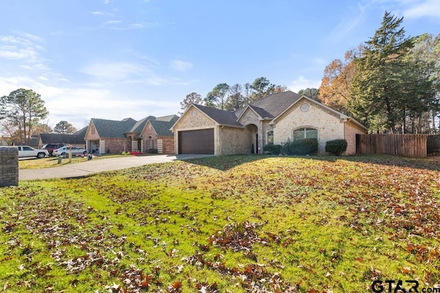 single story home with a garage