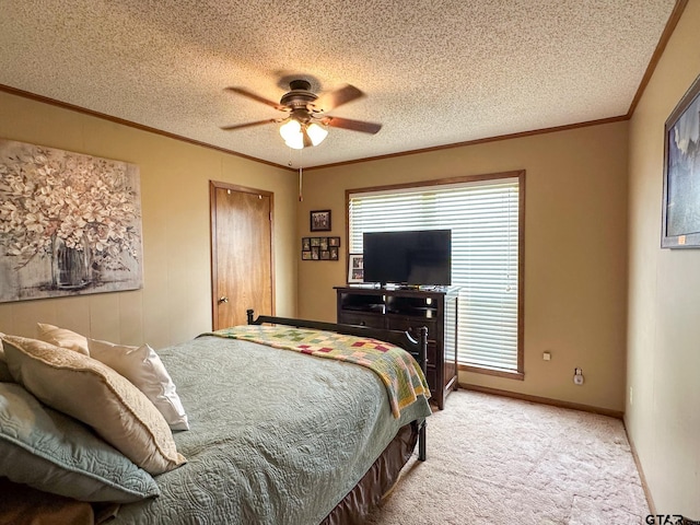 bedroom with crown molding, ceiling fan, baseboards, light carpet, and a textured ceiling