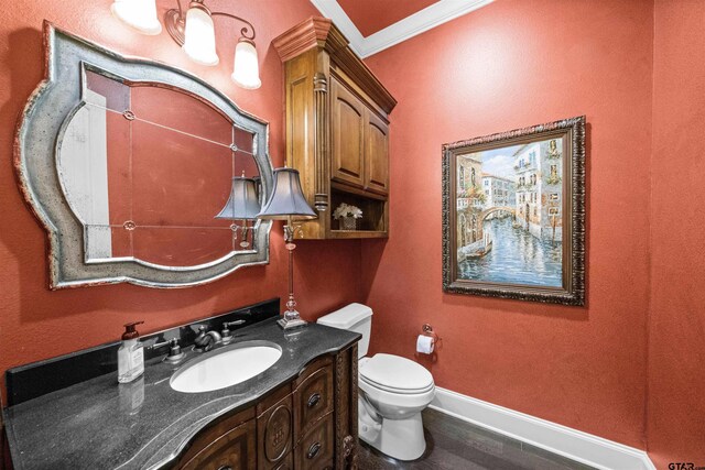 7736 Cross Rd, Tyler, TX 75703 - bathroom with vanity, crown molding, and wood finished floors